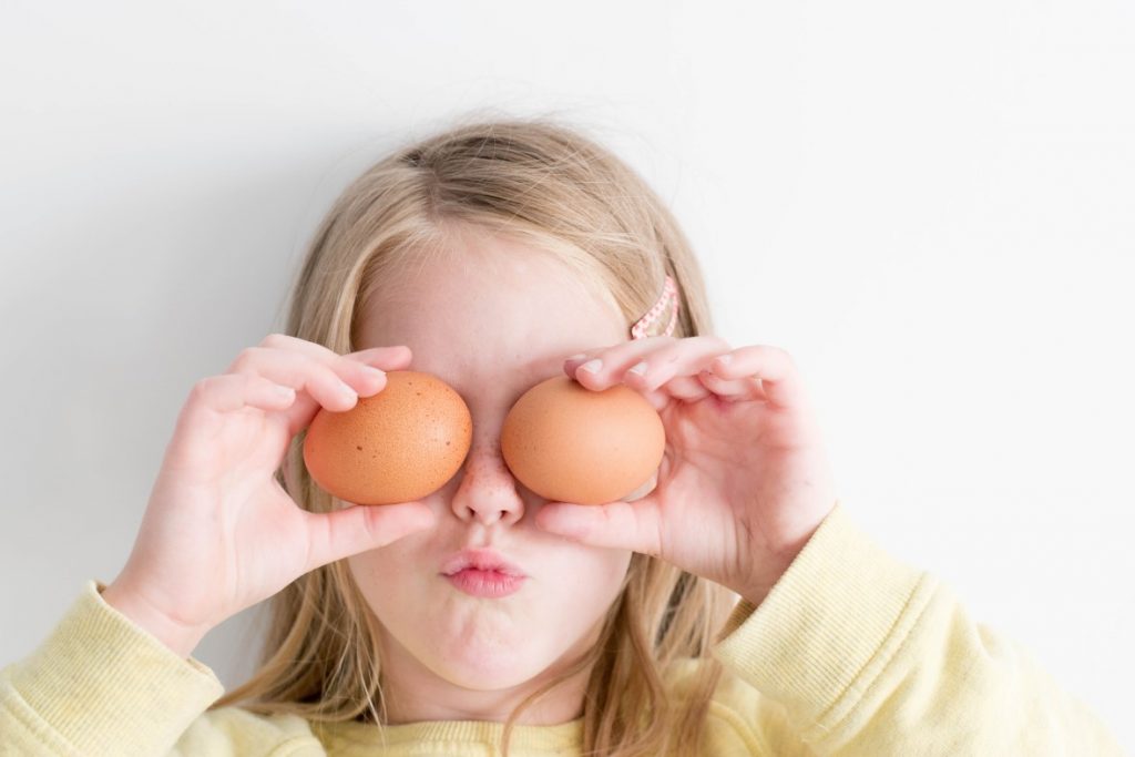 Kids are playful- with eggs in this picture
