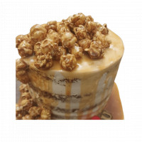 Toffee and Creame Cake with Caramelised Popcorn  online delivery in Noida, Delhi, NCR,
                    Gurgaon