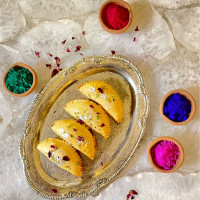 Holi Special Baked Mawa Gujiya online delivery in Noida, Delhi, NCR,
                    Gurgaon