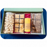 Unique Baked Hamper with Candle online delivery in Noida, Delhi, NCR,
                    Gurgaon