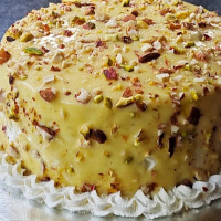 Kesar Pista Kulfi Cake online delivery in Noida, Delhi, NCR,
                    Gurgaon