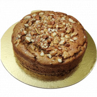Whole Wheat Jaggery and Nuts Cake online delivery in Noida, Delhi, NCR,
                    Gurgaon