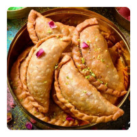 Assorted Baked Whole Wheat Gujiya using Jaggery  online delivery in Noida, Delhi, NCR,
                    Gurgaon