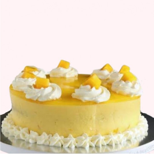 Coconut Cake with Mango Curd Filling - The Seaside Baker